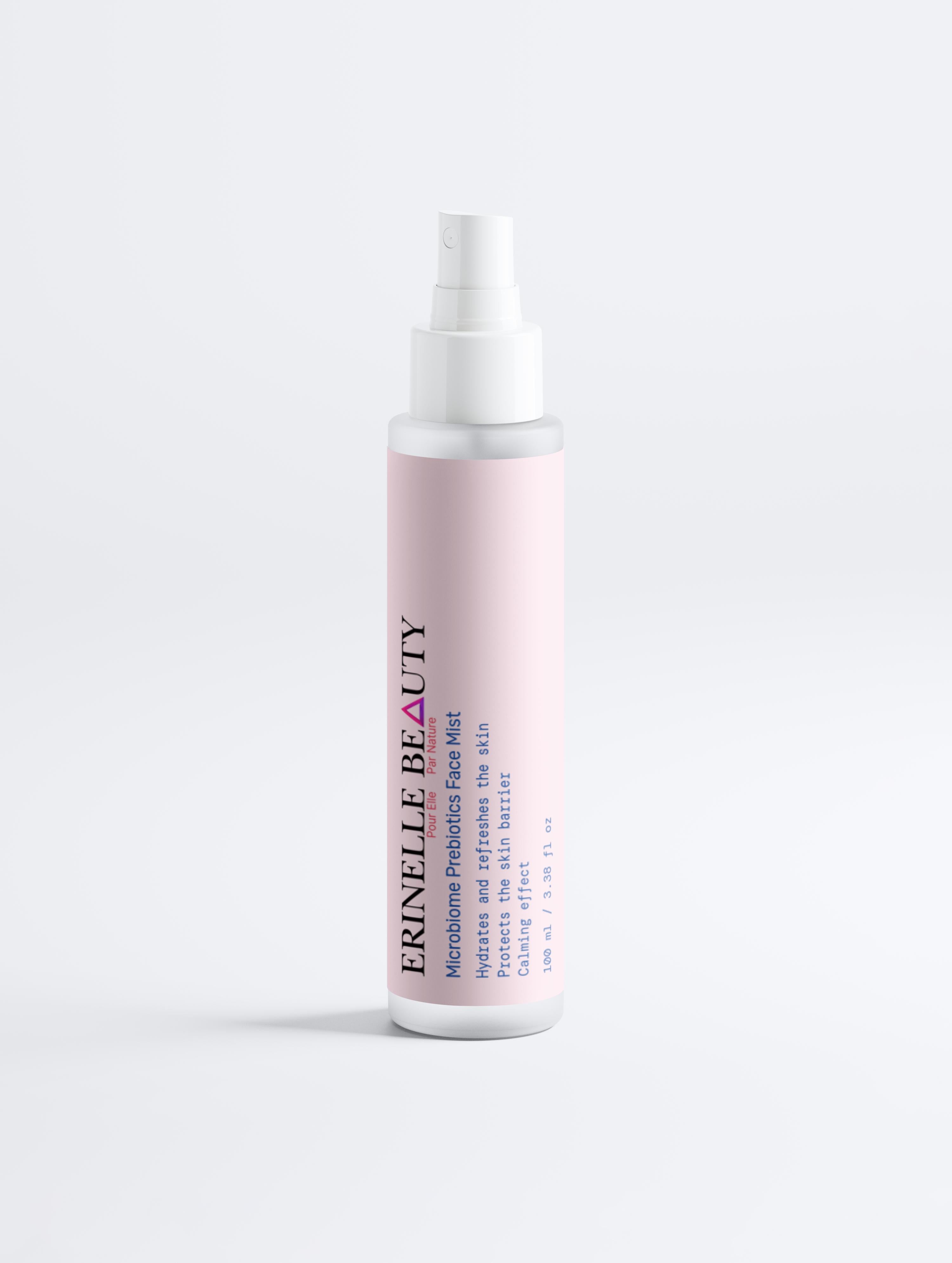 Erinelle Beauty prebiotic beauty spray with clean ingredients in a sleek pink and white bottle