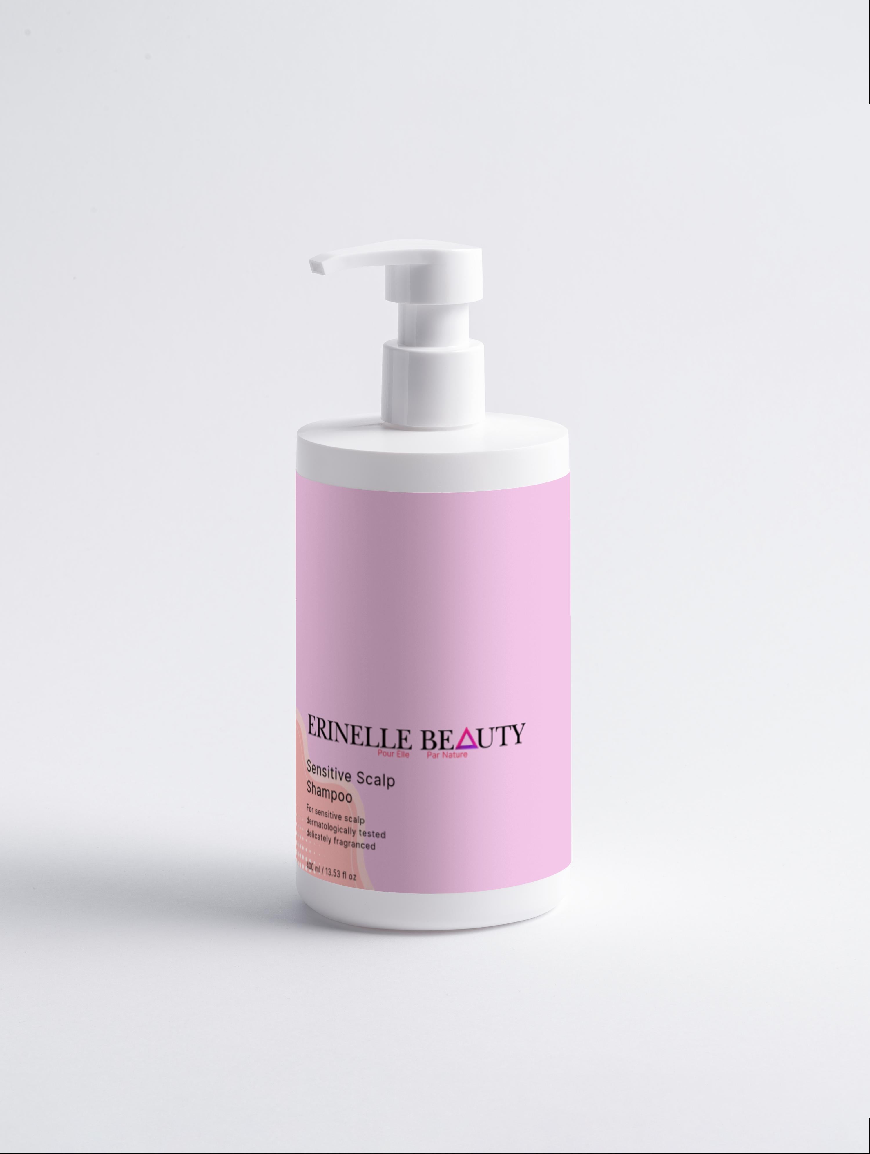 Erinelle Beauty natural shampoo for sensitive scalp in a white pump bottle with pink label