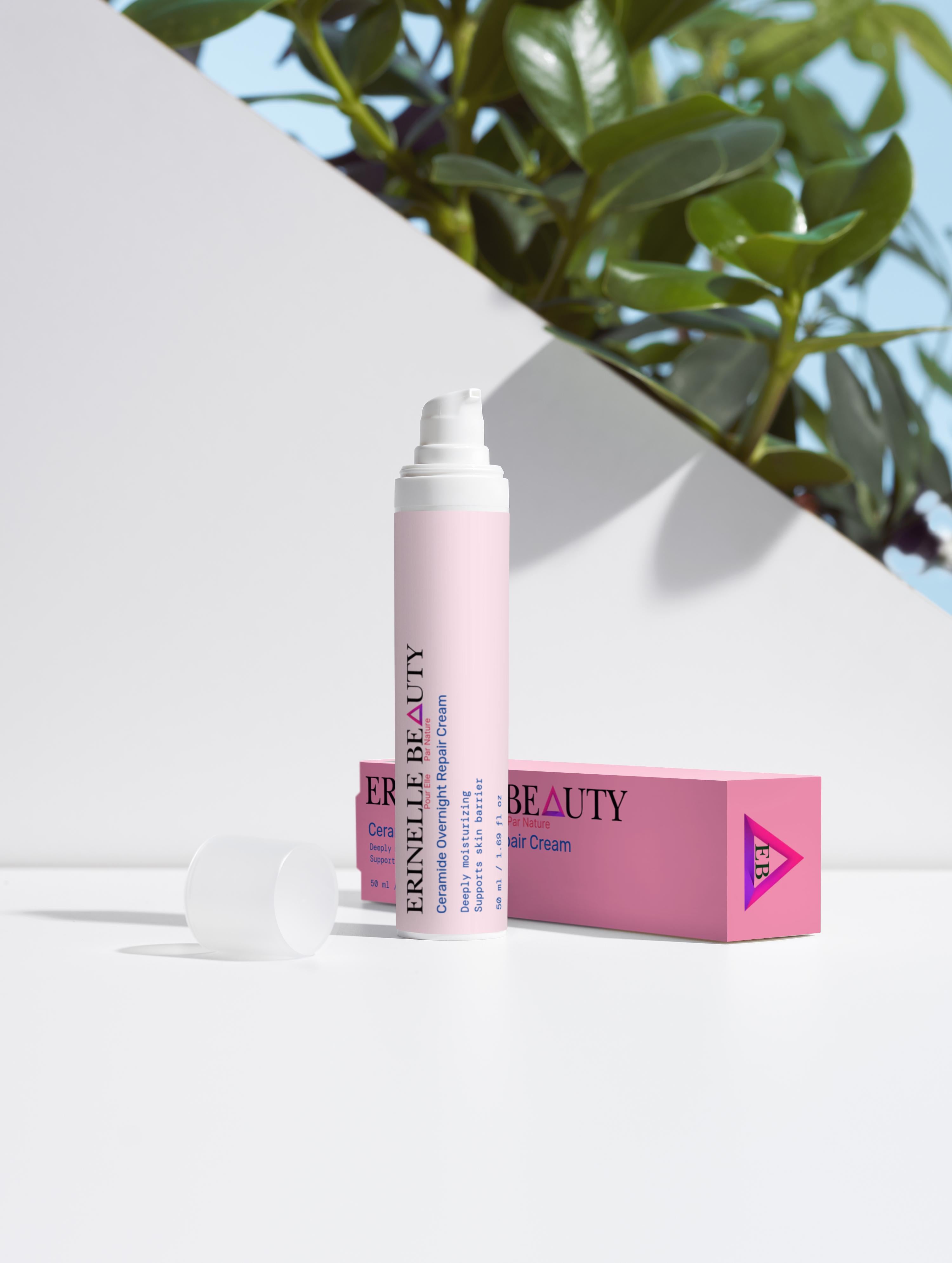 Erinelle Beauty ceramide overnight repair cream in pink pump bottle with matching pink box on white surface